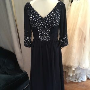 Navy and beaded gown. Great mother of gown
